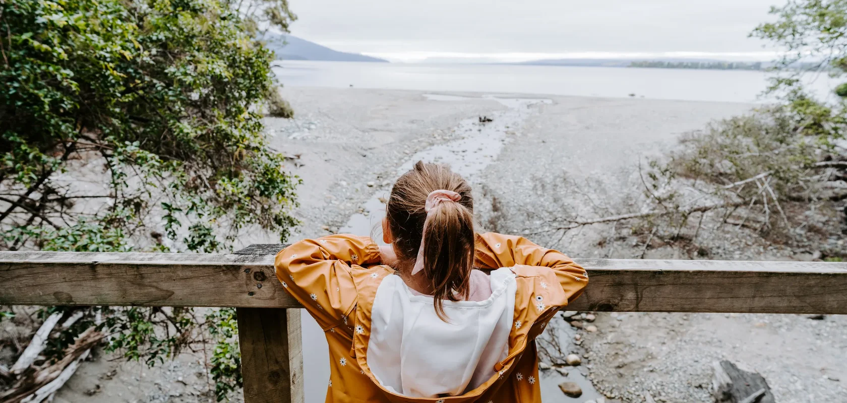 Child looking out over Lake Te Anau on the Brod Bay walk, Fiordland Outdoors