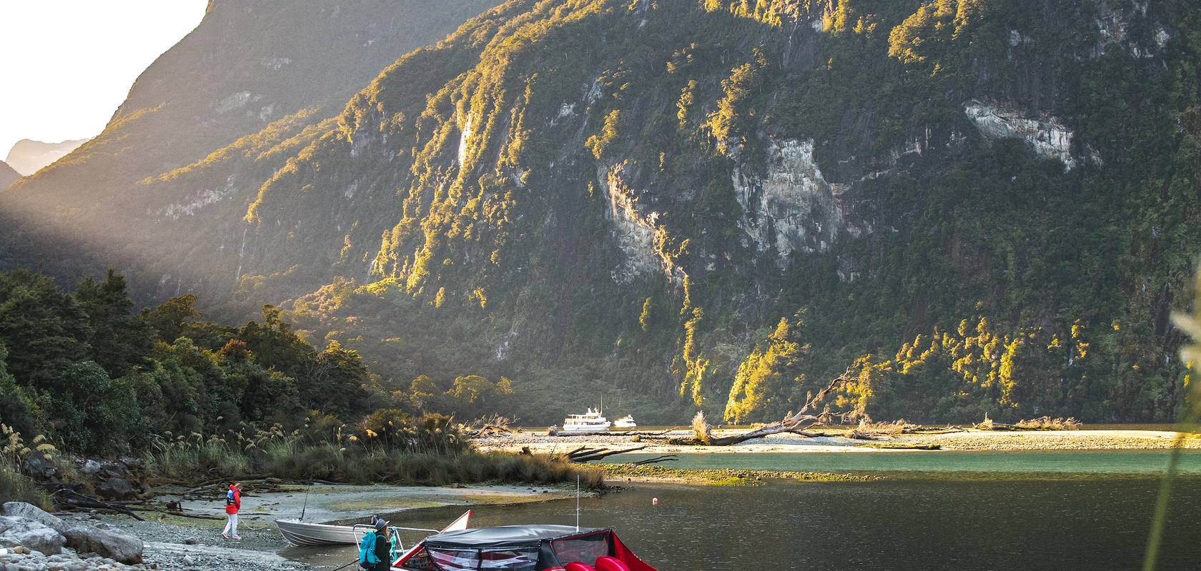 Sunrise in deep water basin,Milford Track Water Taxi, Fiordland New Zealand.webp