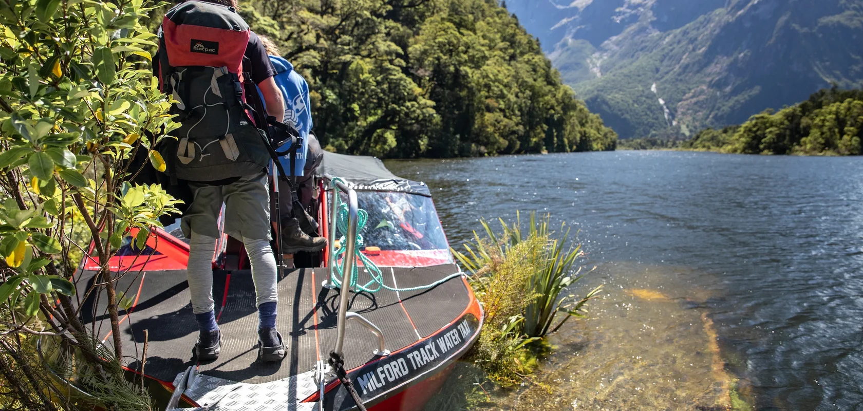 Embarking the Milford Track Water Taxi, Milford Sound New Zealand.webp