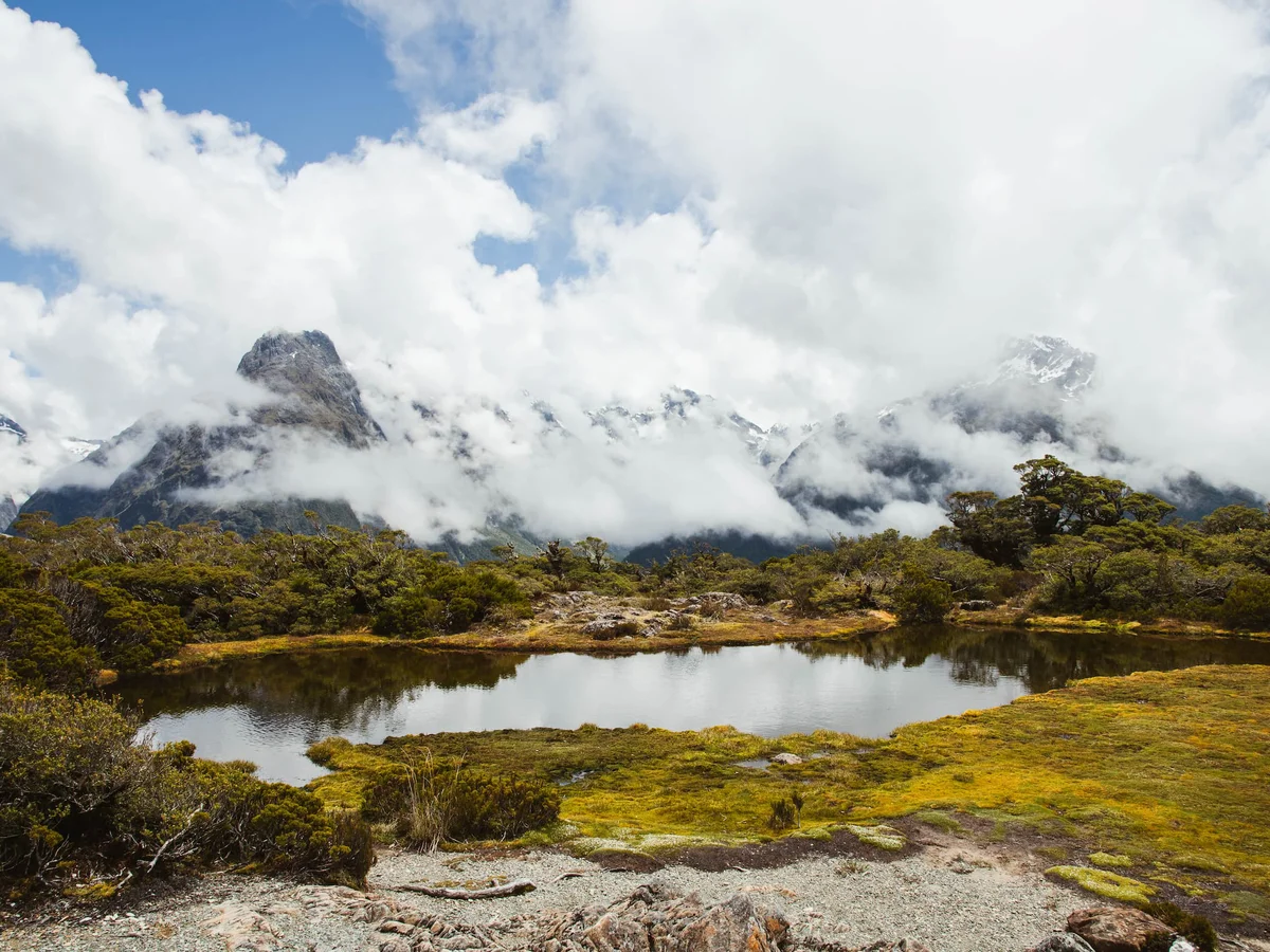 Mirror image of moody skies, On the Routeburn Track New Zealand, Fiordland Outdoors